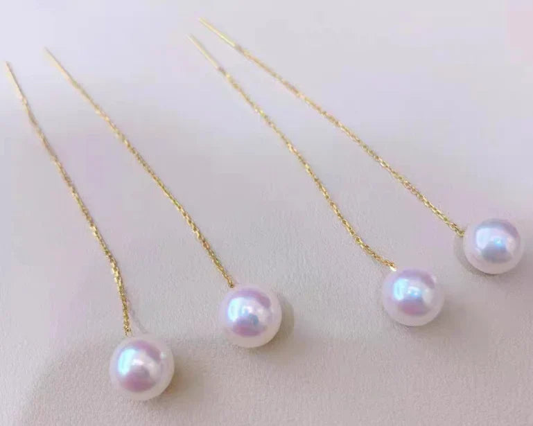 Gold pearl earrings