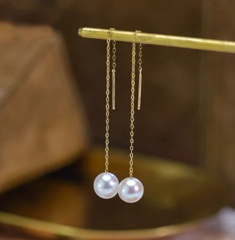 Gold pearl earrings