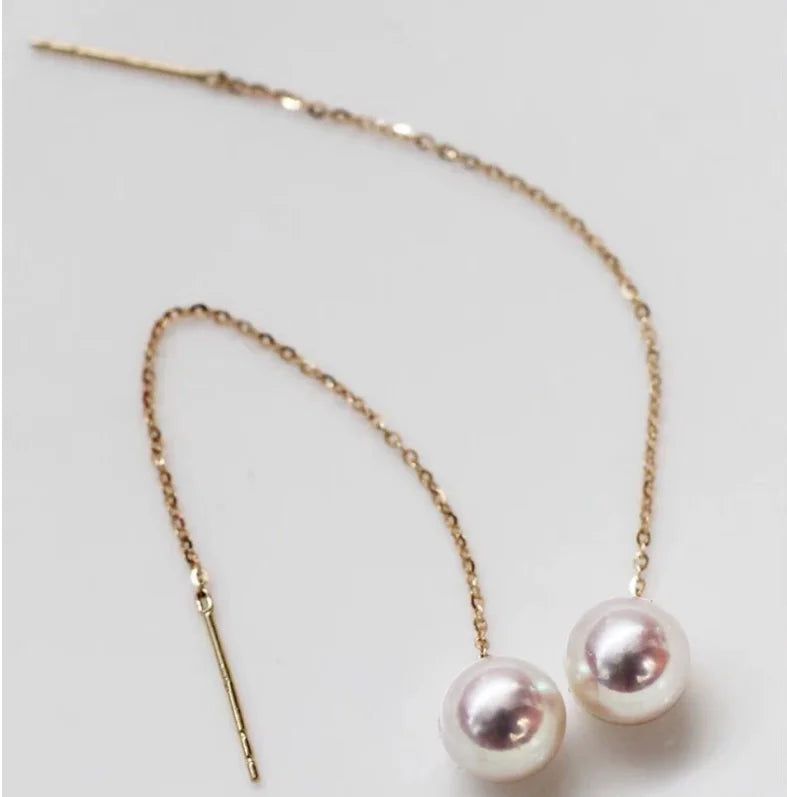 Gold pearl earrings