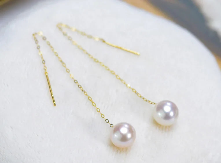 Gold pearl earrings