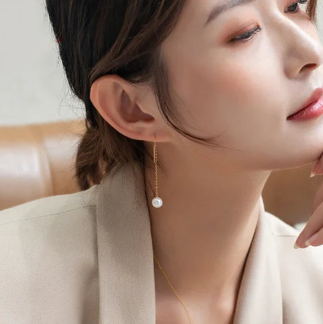 Gold pearl earrings