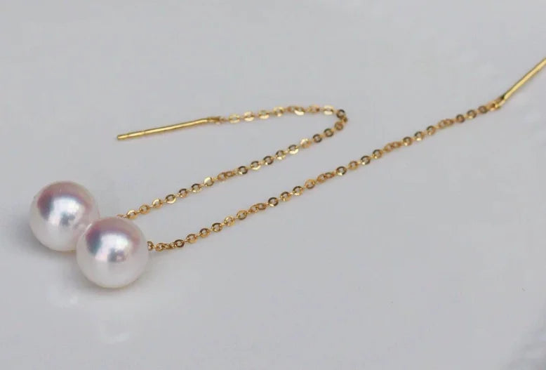 Gold pearl earrings
