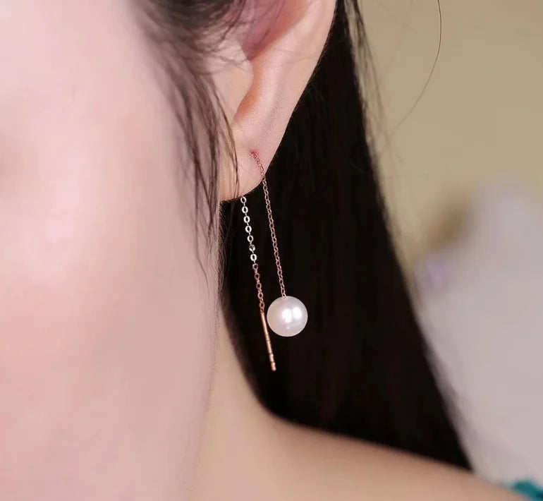 Gold pearl earrings