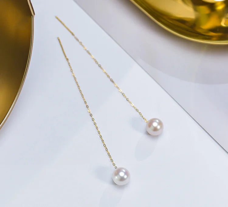 Gold pearl earrings