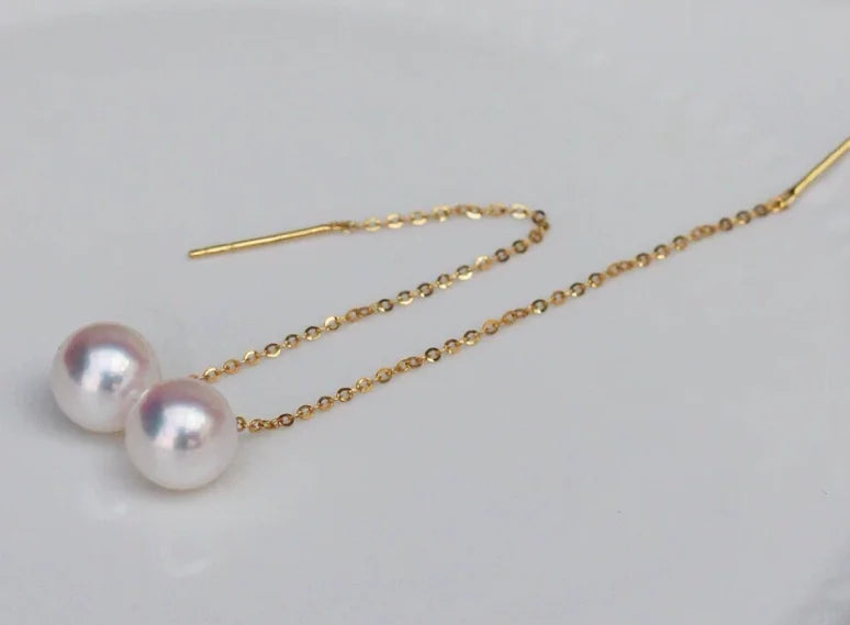 Gold pearl earrings