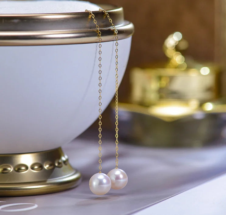 Gold pearl earrings