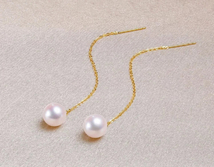 Gold pearl earrings